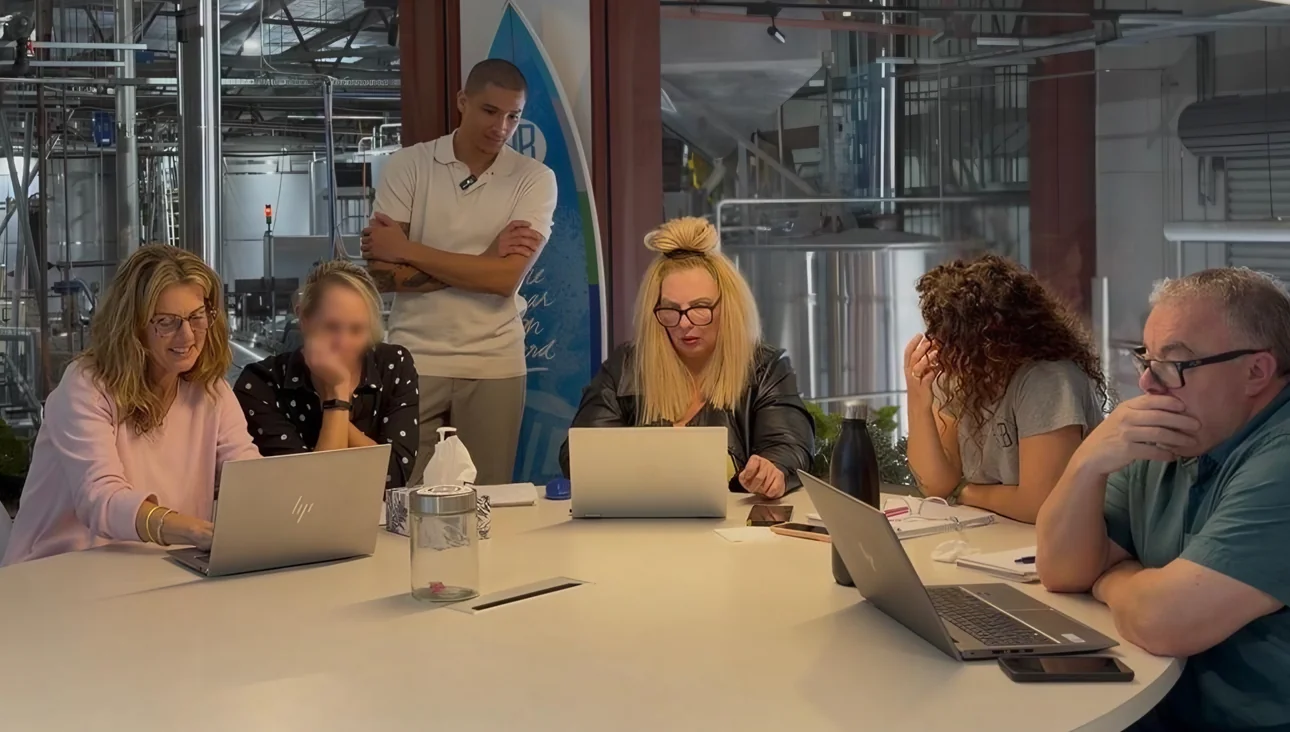 Working together around the table during an AI session